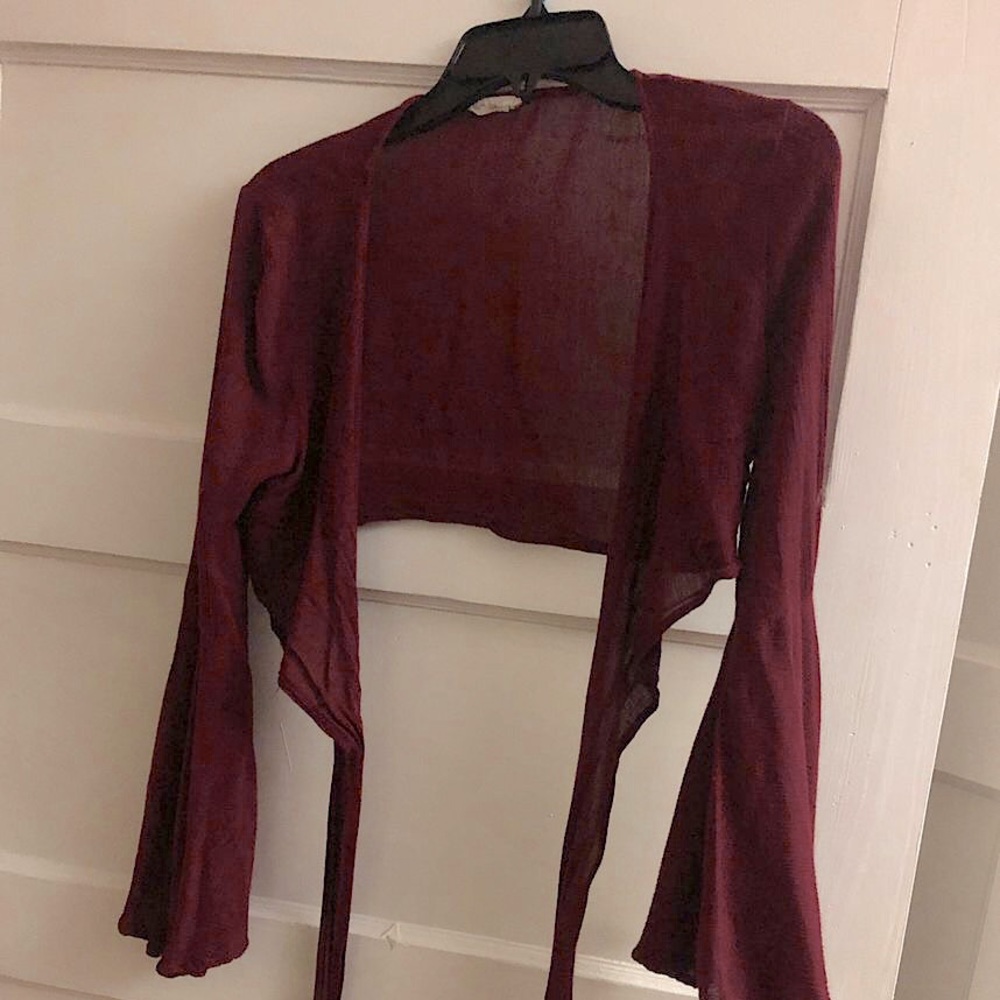 Maroon bell sleeve wrap belted crop top.